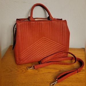 Red hand bag with silver accents